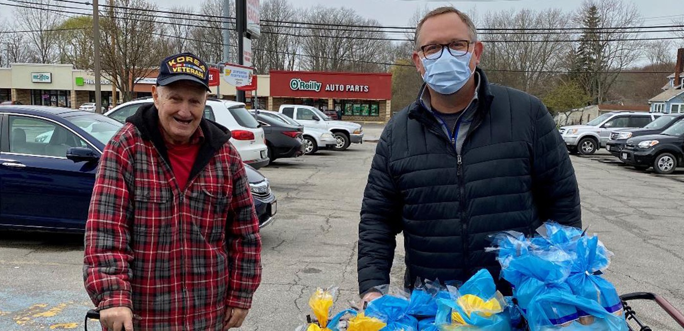 Dentist and patient at community event