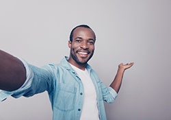 smiling man after learning which cosmetic procedure is right for him