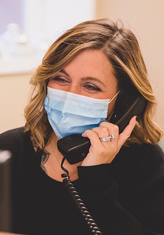 Dental team member wearing face mask