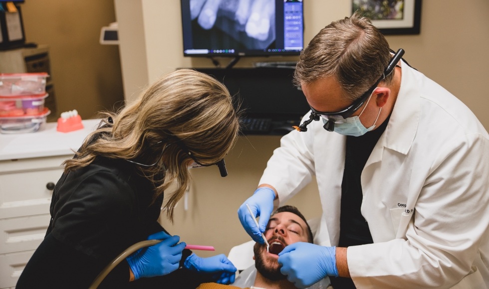 Doctor Owens treating dental patient