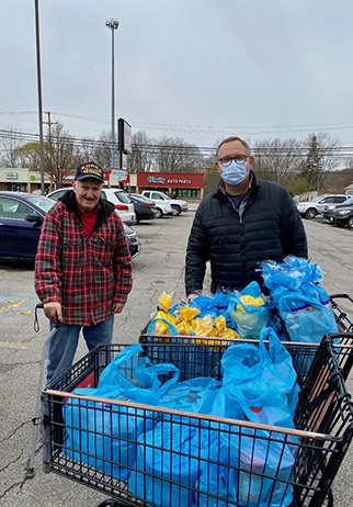 Dentist and patient at Geneva food bank