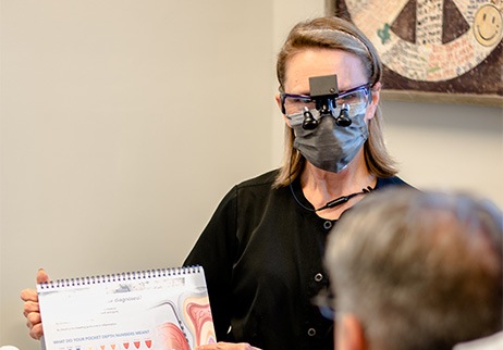 Woman receiving periodontal therapy