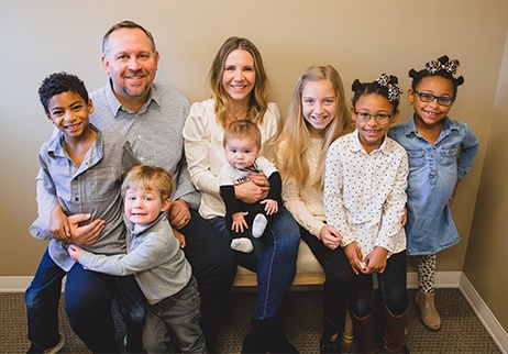 Doctor Cooper and his family at dental office for dental checkups and teeth cleanings