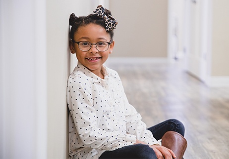 Child smiling after receiving dental sealants