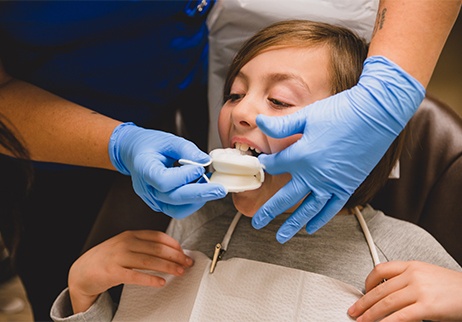 Patient receiving fluoride treatment