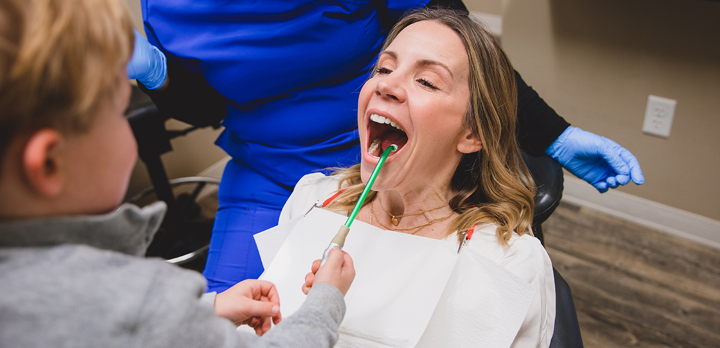 Woman receiving preventive dentistry exam