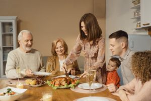 Family enjoying Thanksgiving dinner